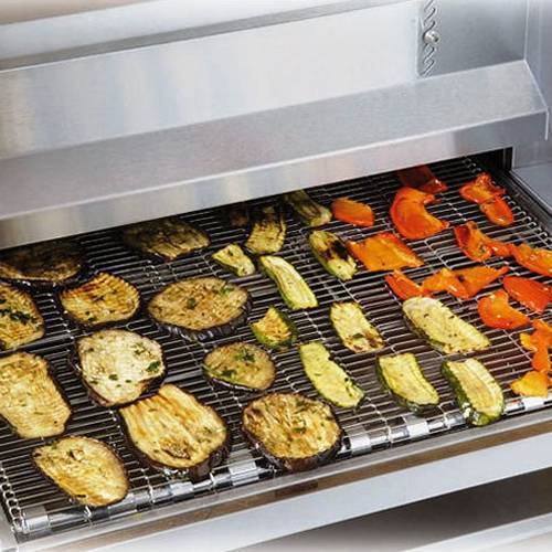 Several vegetables on the conveyor belts.